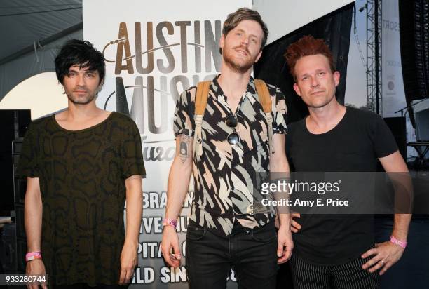 Brandon Duhon, Nick Dudek and Rodney Connell of 'Night Drive' pose backstage at AMA 2018 Winners during SXSW at The SXSW Outdoor Stage presented by...