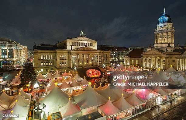 Overall view taken on November 23, 2009 shows the Christmas market on Berlin's central Gendarmenmarkt place between the "Deutscher Dom" , the...