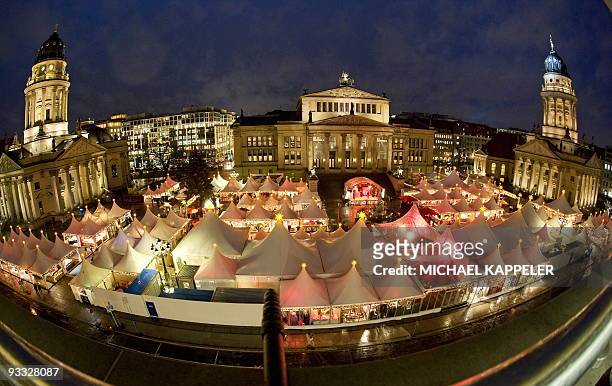 Overall view taken on November 23, 2009 shows the Christmas market on Berlin's central Gendarmenmarkt place between the "Deutscher Dom" , the...