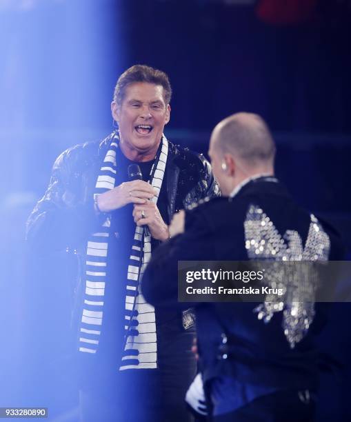 David Hasselhoff and Oli P. Perform during the TV show 'Heimlich! Die grosse Schlager-Ueberraschung' on March 17, 2018 in Munich, Germany.