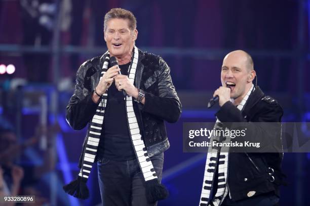 David Hasselhoff and Oli P. Perform during the TV show 'Heimlich! Die grosse Schlager-Ueberraschung' on March 17, 2018 in Munich, Germany.