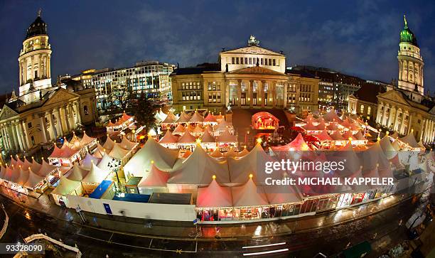 Overall view taken on November 23, 2009 shows the Christmas market on Berlin's central Gendarmenmarkt place between the "Deutscher Dom" , the...