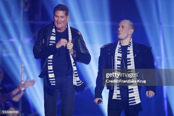 David Hasselhoff and Oli P. Perform during the TV show 'Heimlich! Die grosse Schlager-Ueberraschung' on March 17, 2018 in Munich, Germany.