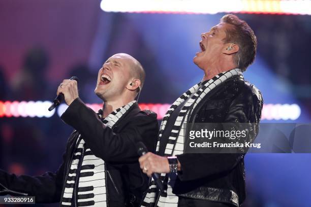 Oli P. And David Hasselhoff perform during the TV show 'Heimlich! Die grosse Schlager-Ueberraschung' on March 17, 2018 in Munich, Germany.