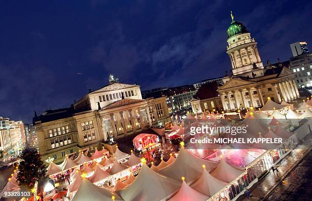 Overall view taken on November 23, 2009 shows the Christmas market on Berlin's central Gendarmenmarkt place between the "Deutscher Dom" , the...