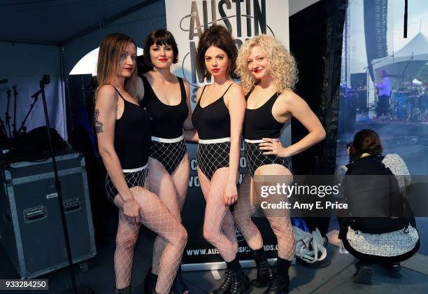 Dancers from 'A Giant Dog' pose backstage at AMA 2018 Winners during SXSW at The SXSW Outdoor Stage presented by MGM Resorts on March 17, 2018 in...