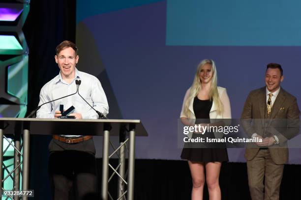 Tyler Moldenhauer poses with the award for Excellence in Animation and Excellence in Art at SXSW Gaming Awards during SXSW at Hilton Austin Downtown...