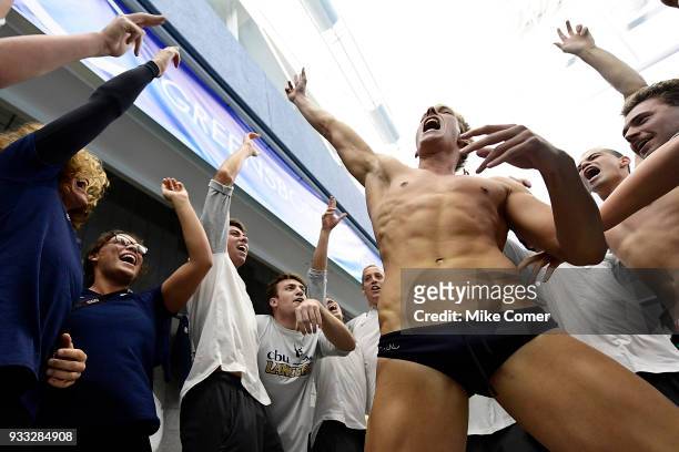 The California Baptist University swim team does a team cheer prior to the start of the Division II Men's and Women's Swimming & Diving Championship...