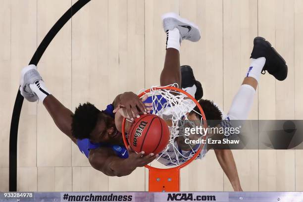 Nick Perkins of the Buffalo Bulls dunks the ball against Kevin Knox of the Kentucky Wildcats in the second round of the 2018 NCAA Men's Basketball...