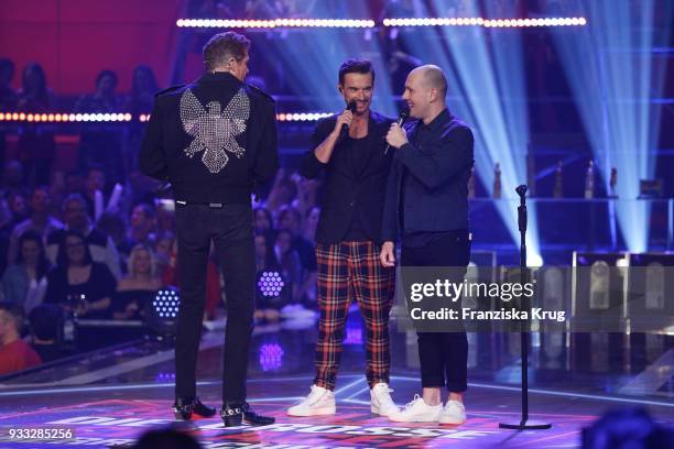 David Hasselhoff, Florian Silbereisen and Oli P. During the tv show 'Heimlich! Die grosse Schlager-Ueberraschung' on March 17, 2018 in Munich,...