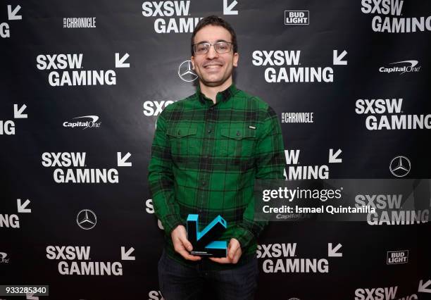 Dan Salvato poses with an award at SXSW Gaming Awards during SXSW at Hilton Austin Downtown on March 17, 2018 in Austin, Texas.
