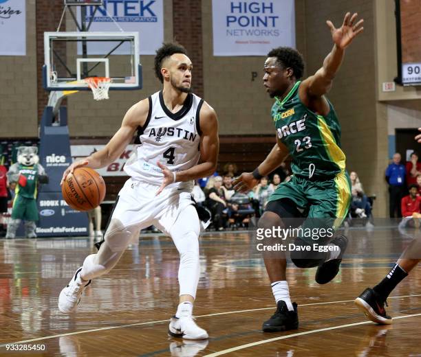 Derrick White from the Austin Spurs drives against Bubu Palo from the Sioux Falls Skyforce during an NBA G-League game on March 17, 2018 at the...