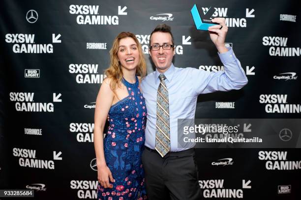 Kristyn Childres and Isaac Childres pose with their award at SXSW Gaming Awards during SXSW at Hilton Austin Downtown on March 17, 2018 in Austin,...
