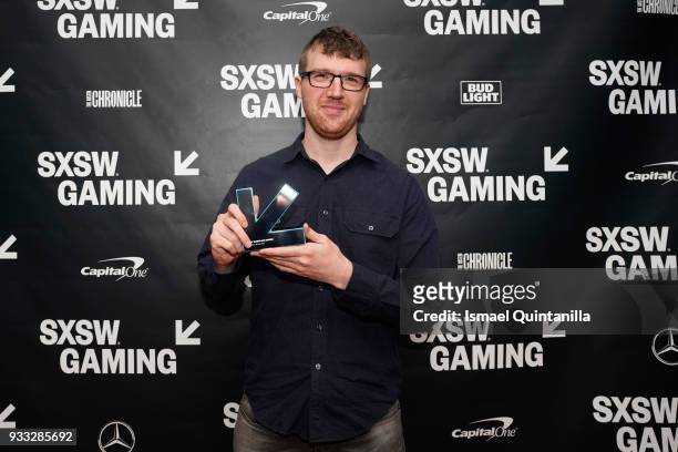 Mike Lunn poses with the award for Game of the Year backstage at SXSW Gaming Awards during SXSW at Hilton Austin Downtown on March 17, 2018 in...