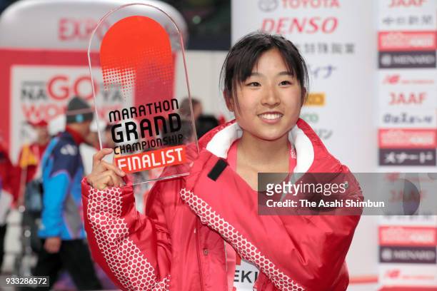 Hanami Sekine of Japan celebrates her third finish after the Nagoya Women's Marathon 2018 at Nagoya Dome on March 11, 2018 in Nagoya, Aichi, Japan.
