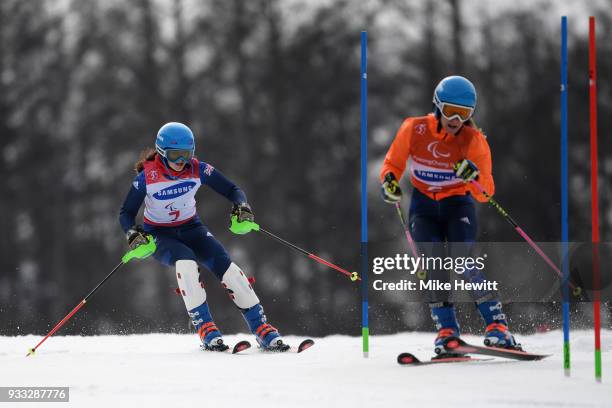 Menna Fitzpatrick of Great Britain on her way to the Gold medal with her guide Jennifer Kehoe in the Women's Slalom, Visually Impaired on day nine of...