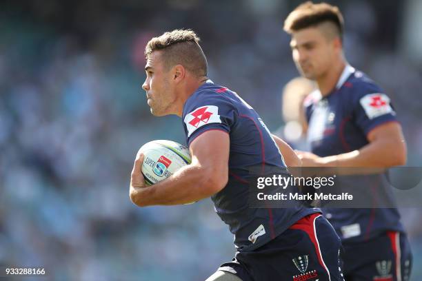 Tom English of the Rebels scores a try during the round five Super Rugby match between the Waratahs and the Rebels at Allianz Stadium on March 18,...