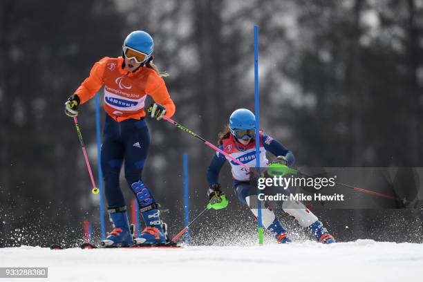 Menna Fitzpatrick of Great Britain on her way to the Gold medal with her guide Jennifer Kehoe in the Women's Slalom, Visually Impaired on day nine of...