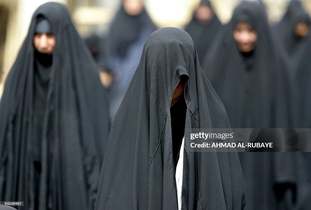 Shiite Muslim Iraqi women perform along