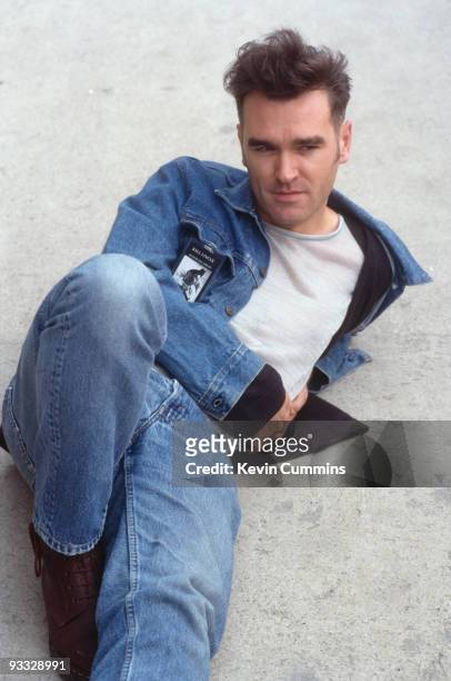 English singer Morrissey in Dublin during his 'Kill Uncle' tour, April 1991. He is wearing a pass featuring a portrait of poet Edith Sitwell.