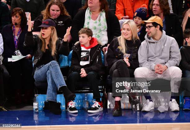 Chloe Sevigny, guest, Carlotta Kohl and Jack Antonoff attend New York Knicks Vs Charlotte Hornets game at Madison Square Garden on March 17, 2018 in...