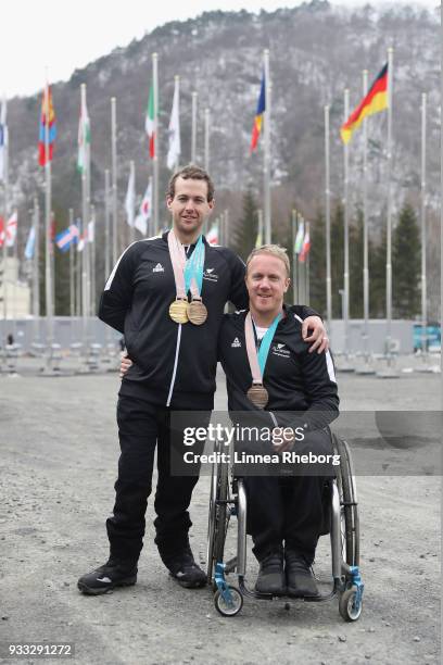 Gold and bronze medalist Adam Hall of New Zealand and bronze medalist Corey Peters of New Zealand poses for a photo at the PyeongChang Paralympic...