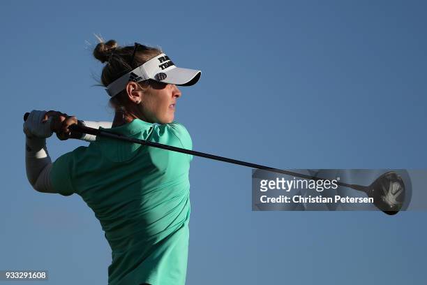 Jessica Korda plays a tee shot on the 18th hole during the third round of the Bank Of Hope Founders Cup at Wildfire Golf Club on March 17, 2018 in...