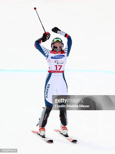 Marie Bochet of France celebrates after winning the gold medal in the Women's Standing Slalom at Jeongseon Alpine Centre on Day 9 of the PyeongChang...