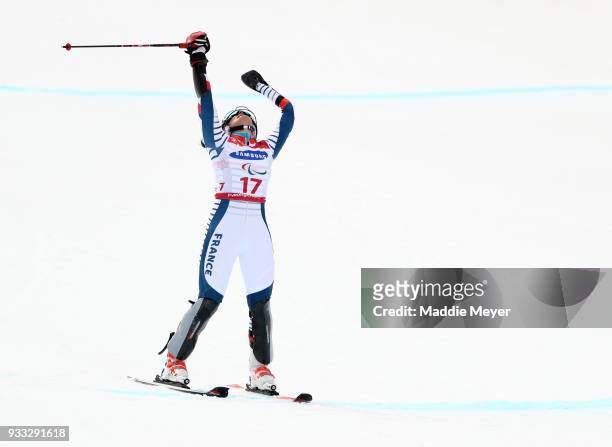 Marie Bochet of France celebrates after winning the gold medal in the Women's Standing Slalom at Jeongseon Alpine Centre on Day 9 of the PyeongChang...