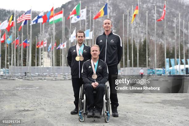 Gold and bronze medalist Adam Hall of New Zealand , bronze medalist Corey Peters of New Zealand and Carl Murphy of New Zealand poses for a photo at...