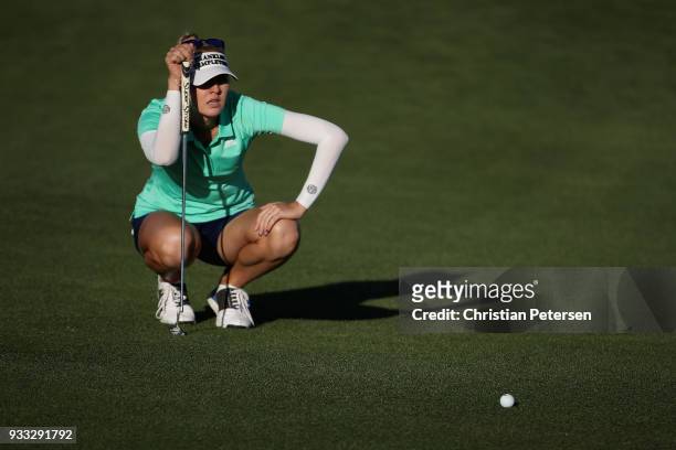 Jessica Korda putts on the 17th green during the third round of the Bank Of Hope Founders Cup at Wildfire Golf Club on March 17, 2018 in Phoenix,...
