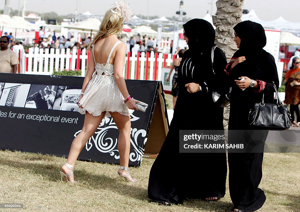 CORRECTING BYLINE: Two veiled Emirati wo
