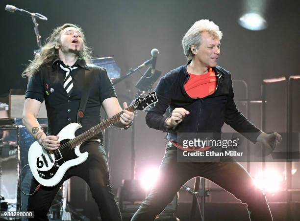 Guitarist Phil X and frontman Jon Bon Jovi of Bon Jovi perform during a stop of the band's This House is Not for Sale Tour at T-Mobile Arena on March...