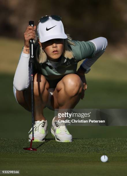 Michelle Wie lines up a putt on the 16th green during the third round of the Bank Of Hope Founders Cup at Wildfire Golf Club on March 17, 2018 in...