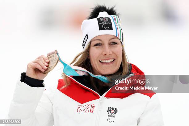 Heike Eder of Austria celebrates with her bronze medal after the Women's Sitting Slalom at Jeongseon Alpine Centre on Day 9 of the PyeongChang 2018...