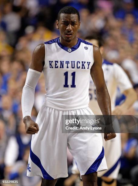 John Wall of the Kentucky Wildcats walks on the court during the game against the Miami University Redhawks at Rupp Arena on November 16, 2009 in...