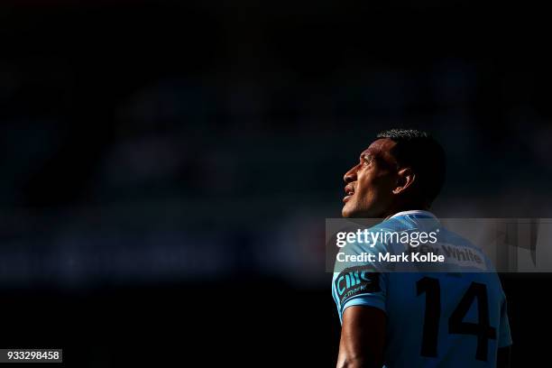 Israel Folau of the Waratahs watches on during the round five Super Rugby match between the Waratahs and the Rebels at Allianz Stadium on March 18,...