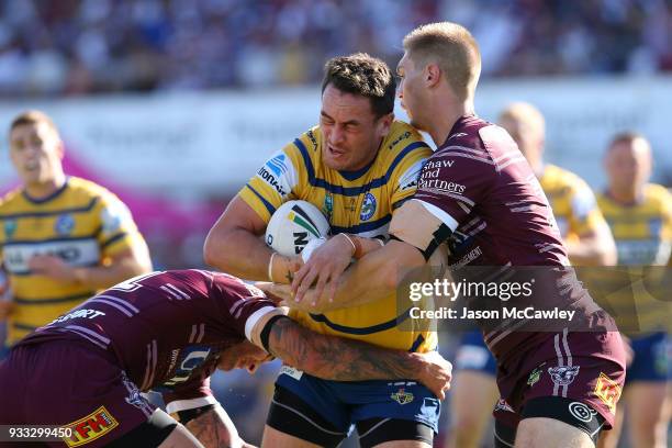 Brad Takairangi of the Eels is tackled during the round two NRL match between the Manly Sea Eagles and the Parramatta Eels at Lottoland on March 18,...