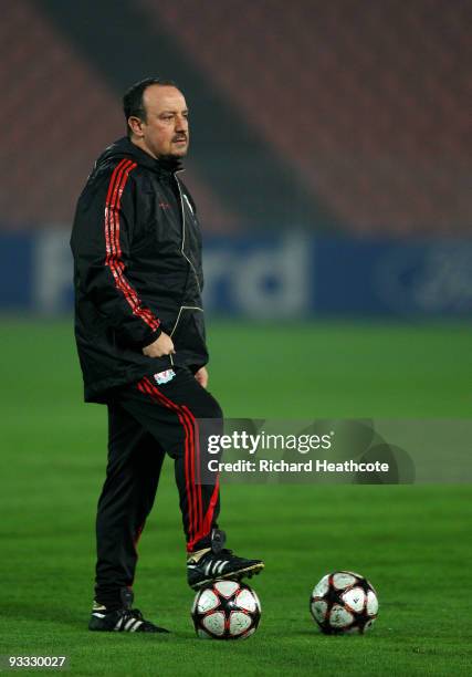 Manager Liverpool Rafael Benitez looks on during the Liverpool training session at the Ferenc Puskas Stadium on November 23, 2009 in Budapest,...