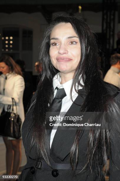 Beatrice Dalle attends the Givenchy Pret a Porter show as part of the Paris Womenswear Fashion Week Spring/Summer 2010 at Lycee Carnot on October 4,...