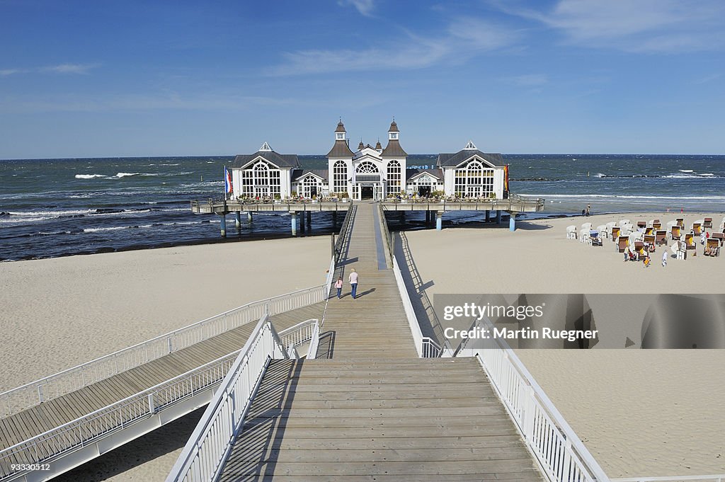Sandy beach with Seabridge, Sellin, Ruegen Island.
