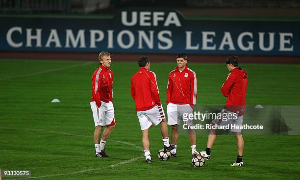 Dirk Kuyt, Jamie Carragher, Steven Gerrard and Daniel Agger of Liverpool attend the Liverpool training session at the Ferenc Puskas Stadium on...