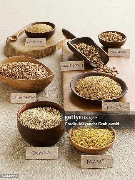 assorted labeled grains - wholegrain foto e immagini stock