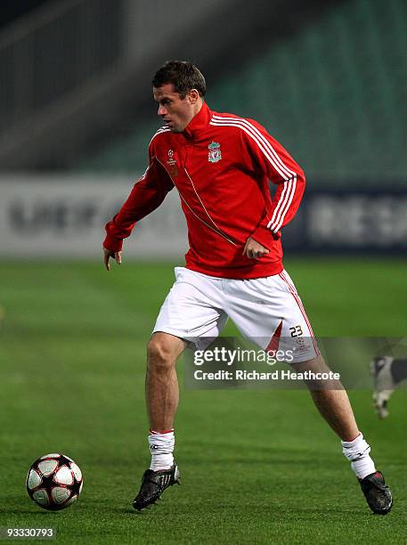 Jamie Carragher of Liverpool in action during the Liverpool training session at the Ferenc Puskas Stadium on November 23, 2009 in Budapest, Hungary....