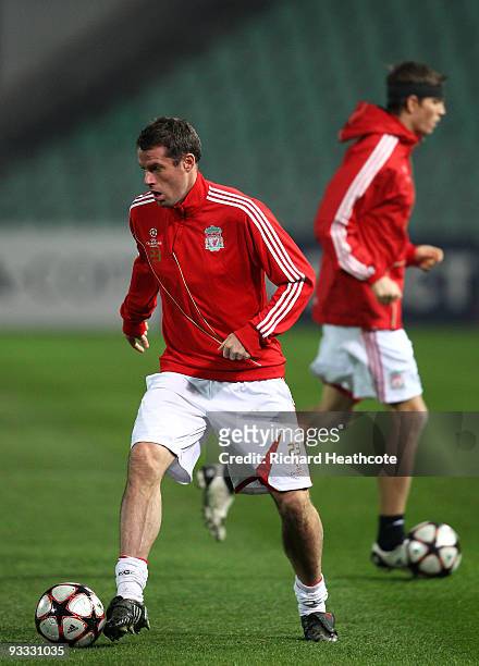 Jamie Carragher of Liverpool in action during the Liverpool Training session at the Ferenc Puskas Stadium on November 23, 2009 in Budapest, Hungary....