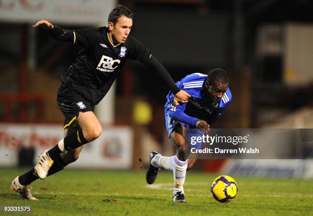 Gael Kakuta of Chelsea Reserves and Keith Fahey of Birmingham City Reserves compete during a Barclays Premier Reserve League south match between...