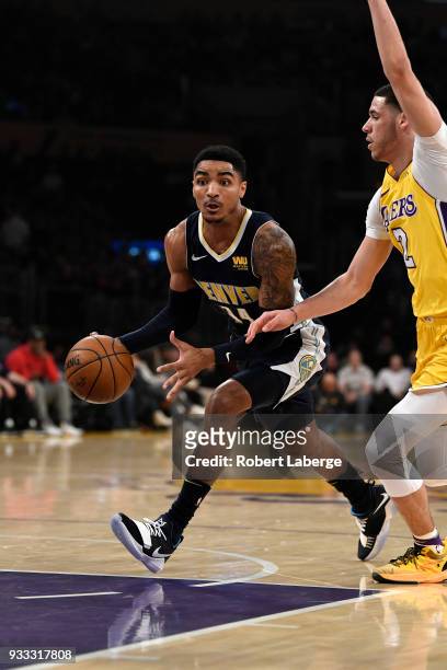 Gary Harris of the Denver Nuggets plays against Lonzo Ball of the Los Angeles Lakers on March 13, 2018 at STAPLES Center in Los Angeles, California....