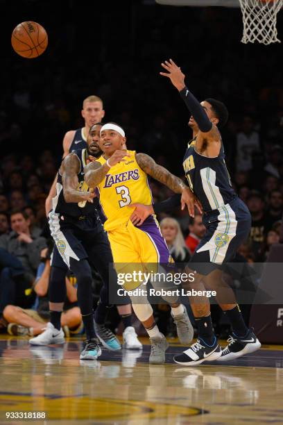 Isaiah Thomas of the Los Angeles Lakers plays against Will Barton and Gary Harris of the Denver Nuggets on March 13, 2018 at STAPLES Center in Los...