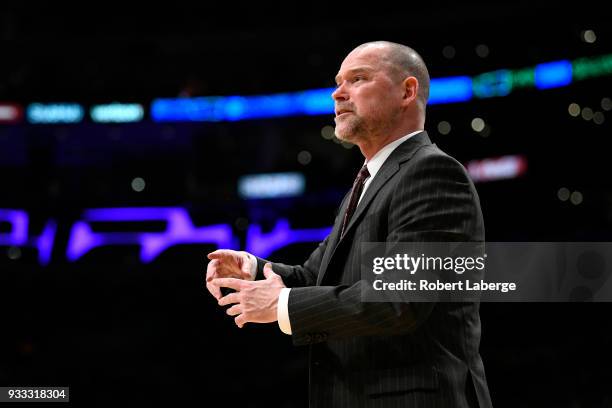 Michael Malone head coach of the Denver Nuggets argues with an official during the game against the Los Angeles Lakers on March 13, 2018 at STAPLES...