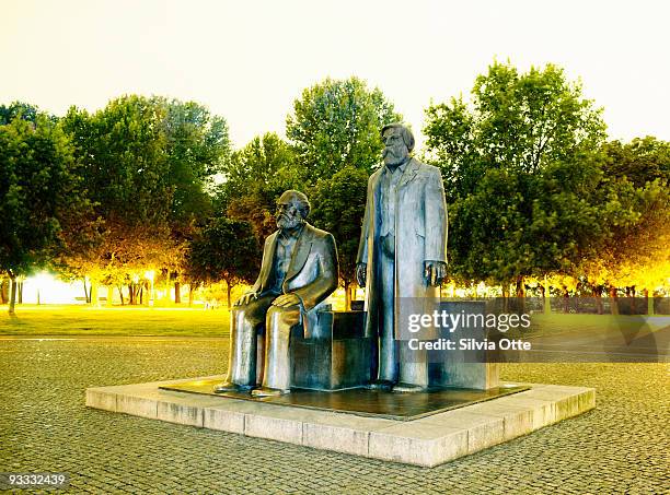 marx and engels statue in berlin - karl marx stock pictures, royalty-free photos & images